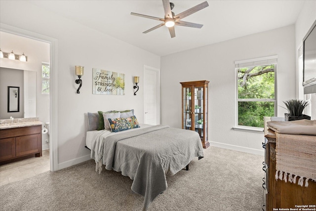 110 Madrone Trl, Boerne, TX 78006 - bedroom with light carpet, multiple windows, and baseboards