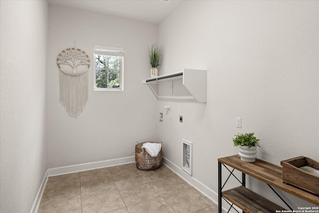 110 Madrone Trl, Boerne, TX 78006 - laundry area with baseboards, hookup for a gas dryer, hookup for an electric dryer, and laundry area