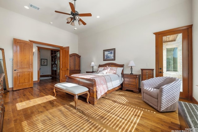 4001 Bell Springs Rd, Dripping Springs, TX 78620 - bedroom featuring hardwood / wood-style flooring, visible vents, high vaulted ceiling, and a ceiling fan