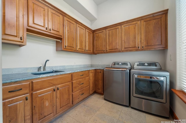4001 Bell Springs Rd, Dripping Springs, TX 78620 - laundry area with washing machine and dryer, cabinet space, and a sink
