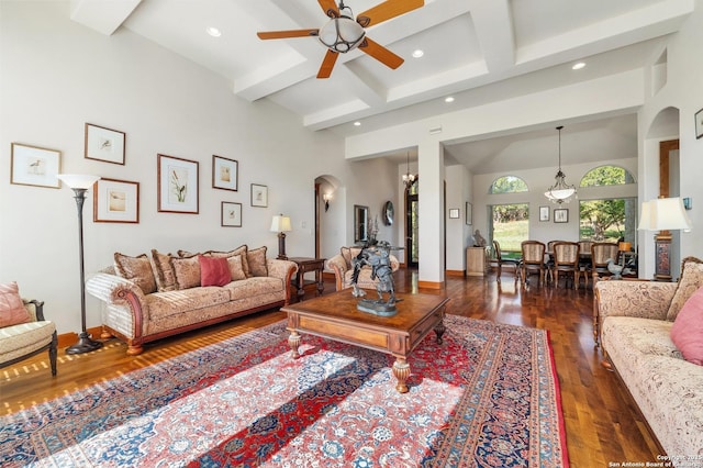 4001 Bell Springs Rd, Dripping Springs, TX 78620 - living area with dark wood-style floors, arched walkways, recessed lighting, beamed ceiling, and a ceiling fan