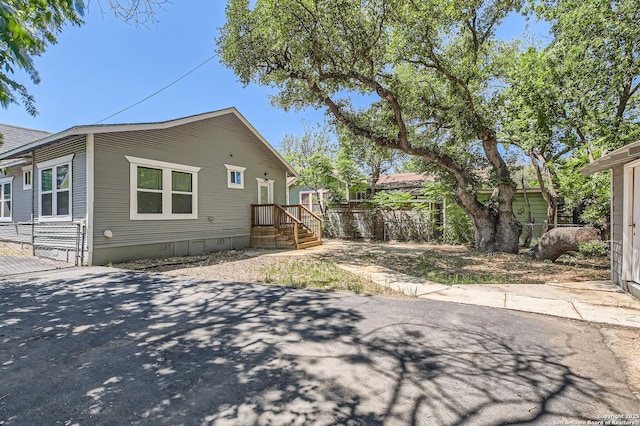 view of side of property featuring crawl space