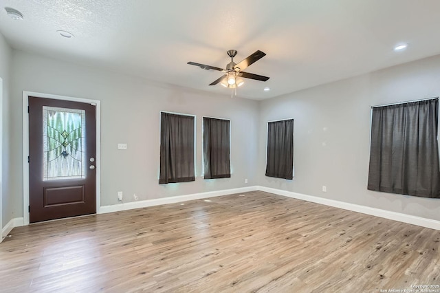 entrance foyer with ceiling fan, baseboards, wood finished floors, and recessed lighting
