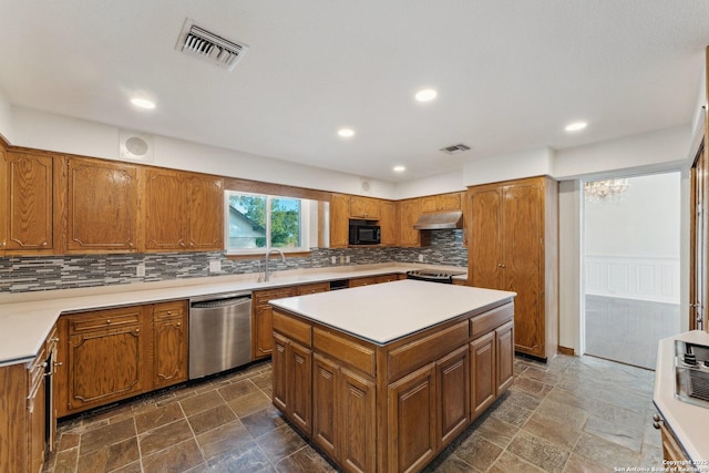 kitchen with stainless steel dishwasher, brown cabinetry, black microwave, under cabinet range hood, and visible vents
