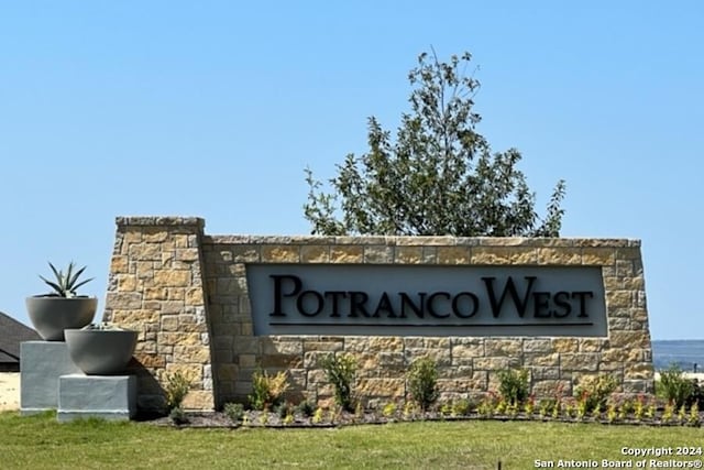 view of community sign