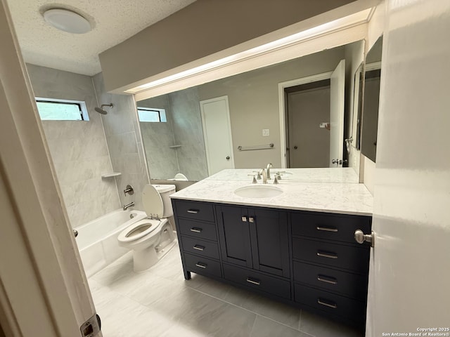 bathroom with shower / washtub combination, toilet, vanity, and a textured ceiling
