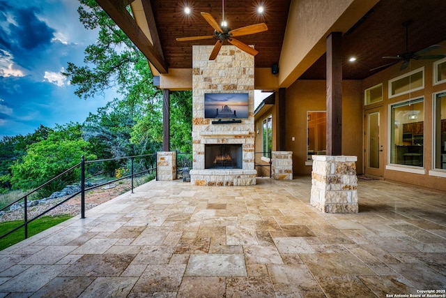 114 Riverwalk, Boerne, TX 78006 - view of patio featuring ceiling fan and an outdoor stone fireplace