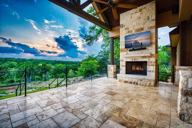 114 Riverwalk, Boerne, TX 78006 - view of patio with ceiling fan and an outdoor stone fireplace