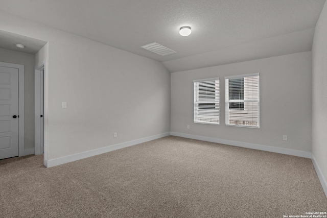 133 Bailey Blf, San Antonio, TX 78253 - empty room featuring light carpet, lofted ceiling, visible vents, and baseboards