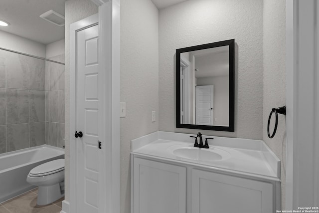 133 Bailey Blf, San Antonio, TX 78253 - full bathroom with vanity, shower / tub combination, visible vents, toilet, and a textured wall