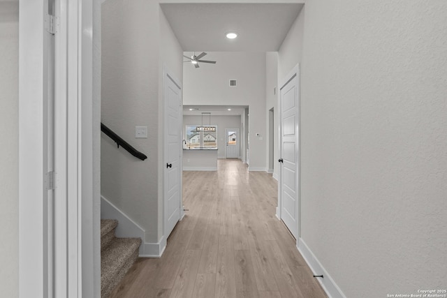 133 Bailey Blf, San Antonio, TX 78253 - hallway featuring stairway, light wood-style flooring, baseboards, visible vents, and recessed lighting