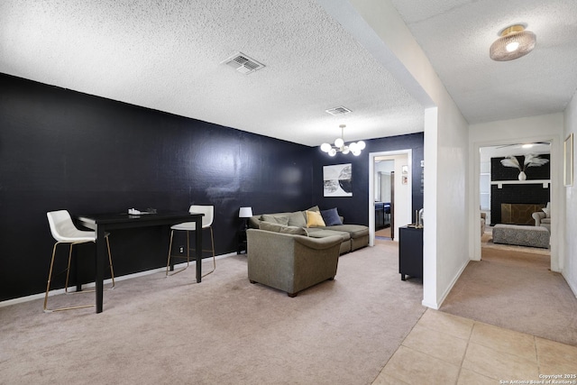 6807 Burnley, San Antonio, TX 78239 - living room with a textured ceiling, visible vents, carpet floors, and a notable chandelier