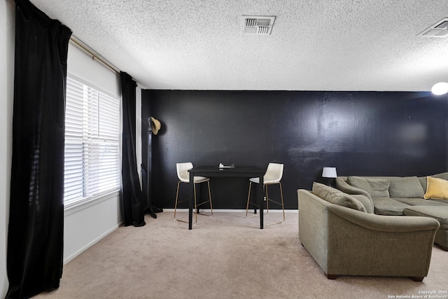 6807 Burnley, San Antonio, TX 78239 - interior space with carpet floors, a textured ceiling, visible vents, and baseboards