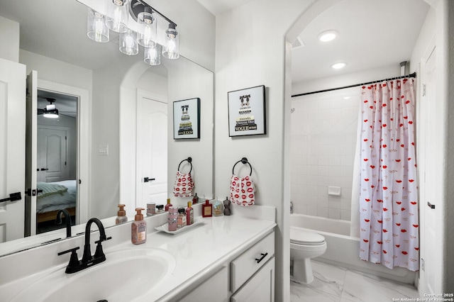 3110 Bonita Spgs, San Antonio, TX 78258 - ensuite bathroom featuring marble finish floor, shower / bath combination with curtain, toilet, vanity, and ceiling fan