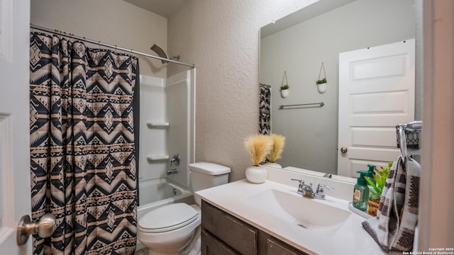 bathroom with shower / tub combo, toilet, a textured wall, and vanity