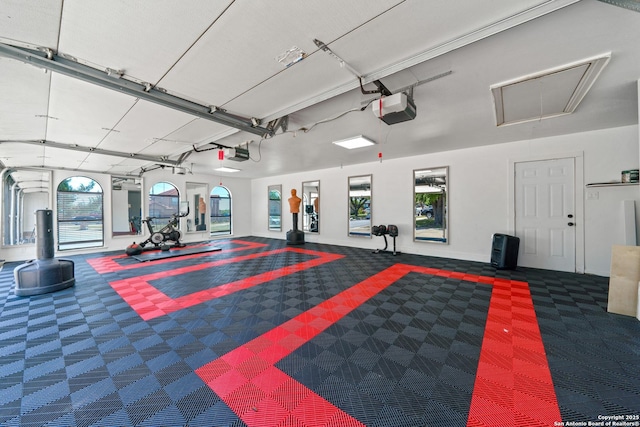 garage featuring a garage door opener
