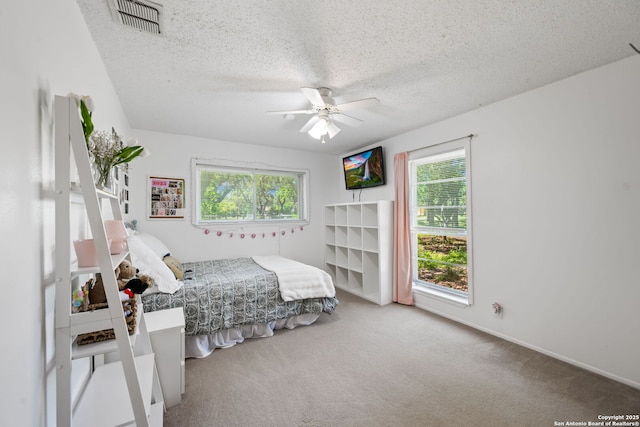 9416 Geronimo Vw, San Antonio, TX 78254 - bedroom with carpet, a textured ceiling, and ceiling fan