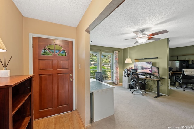 9416 Geronimo Vw, San Antonio, TX 78254 - entrance foyer with a textured ceiling and a ceiling fan