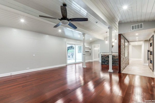 105 Parade, San Antonio, TX 78213 - unfurnished living room featuring hardwood / wood-style floors, decorative columns, visible vents, and wood ceiling