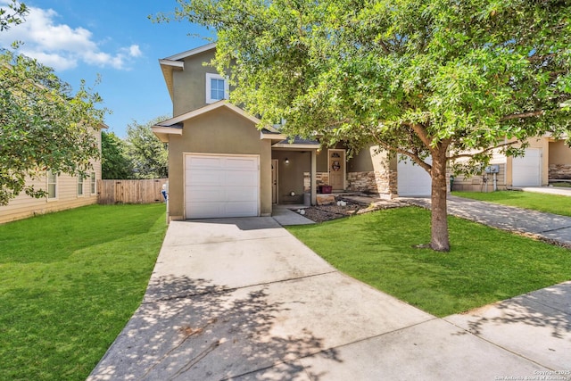 5103-5105 Flipper, San Antonio, TX 78238 - view of front facade featuring a front yard, concrete driveway, stucco siding, and fence