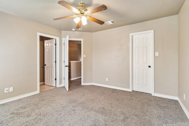 5103-5105 Flipper, San Antonio, TX 78238 - unfurnished bedroom with light colored carpet, ceiling fan, baseboards, and visible vents