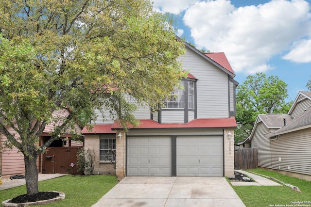 3654 Candlehead, San Antonio, TX 78244 - view of front of house with concrete driveway, an attached garage, brick siding, and fence