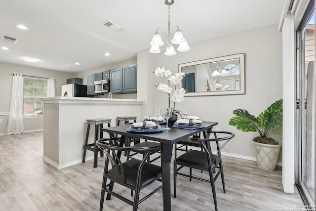 3654 Candlehead, San Antonio, TX 78244 - dining space with baseboards, light wood-style floors, and visible vents