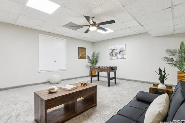 3654 Candlehead, San Antonio, TX 78244 - carpeted living room with a paneled ceiling, baseboards, and ceiling fan