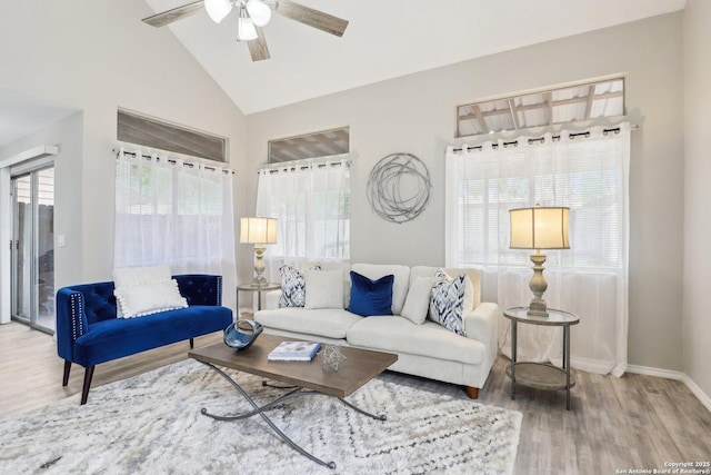 3654 Candlehead, San Antonio, TX 78244 - living area featuring baseboards, wood finished floors, high vaulted ceiling, and ceiling fan