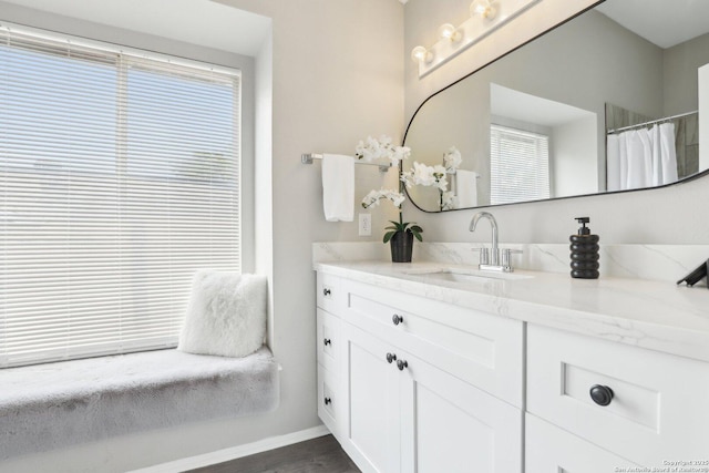 3654 Candlehead, San Antonio, TX 78244 - full bathroom with baseboards, wood finished floors, and vanity