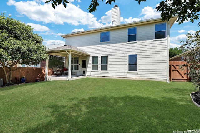 711 Point Spgs, San Antonio, TX 78253 - rear view of house with a lawn, fence, and a patio area