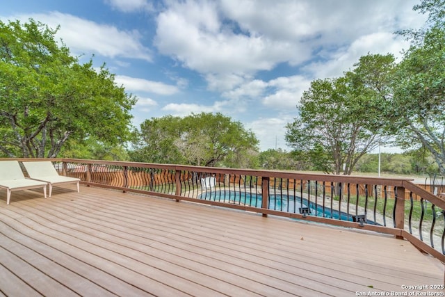19111 Nature Oaks, San Antonio, TX 78258 - wooden terrace featuring an outdoor pool