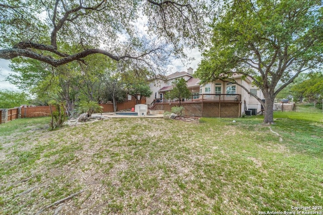 19111 Nature Oaks, San Antonio, TX 78258 - view of yard featuring a fenced backyard, central air condition unit, and a deck