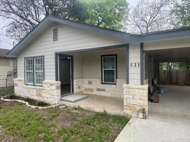 531 Cottonwood, San Antonio, TX 78225 - view of front of home with fence and stone siding