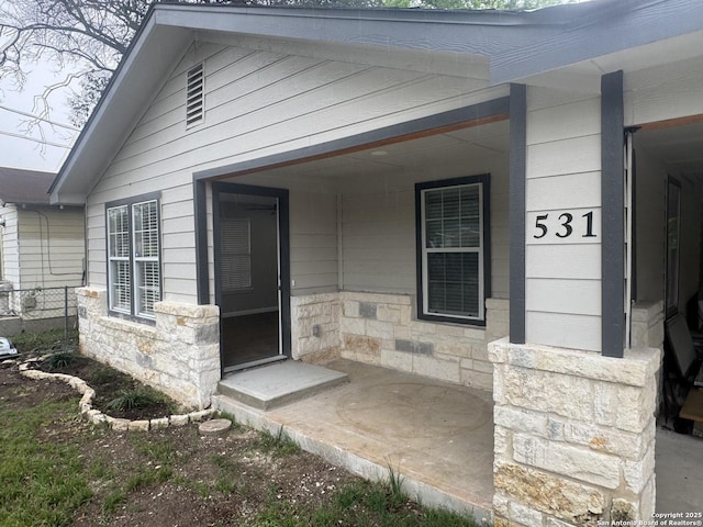 531 Cottonwood, San Antonio, TX 78225 - doorway to property featuring stone siding