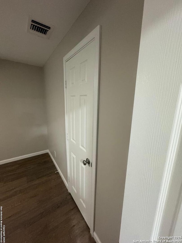 531 Cottonwood, San Antonio, TX 78225 - hallway featuring baseboards, dark wood-style flooring, and visible vents