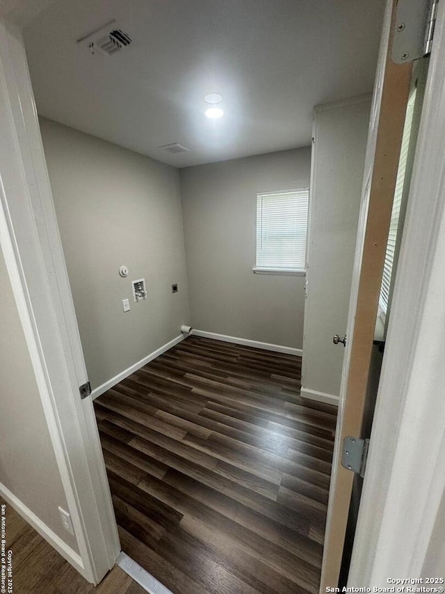 531 Cottonwood, San Antonio, TX 78225 - washroom featuring electric dryer hookup, wood finished floors, visible vents, and laundry area