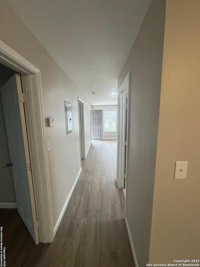 531 Cottonwood, San Antonio, TX 78225 - corridor featuring baseboards and wood finished floors
