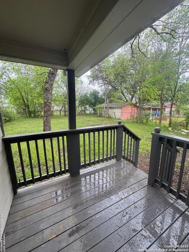 531 Cottonwood, San Antonio, TX 78225 - wooden deck featuring a lawn