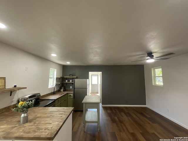 3108 Vera Cruz, San Antonio, TX 78207 - kitchen featuring a wealth of natural light, open shelves, stainless steel appliances, and a sink