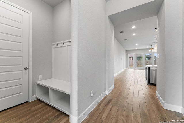 mudroom featuring visible vents, baseboards, wood finished floors, and recessed lighting