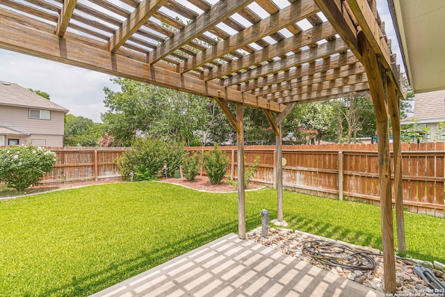 view of yard with a pergola, a fenced backyard, and a patio area