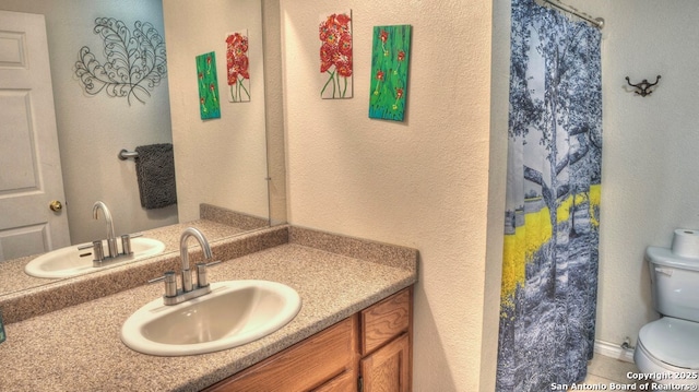 full bathroom with toilet, a shower with shower curtain, vanity, and tile patterned floors