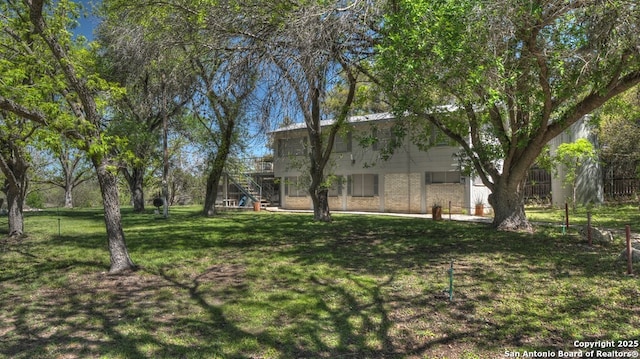 view of yard with stairs
