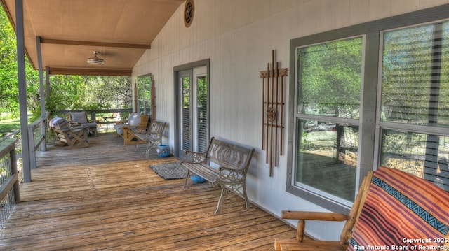 wooden terrace with covered porch