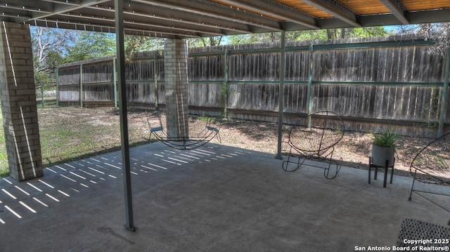 view of patio with a fenced backyard