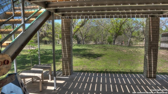 view of patio with stairs