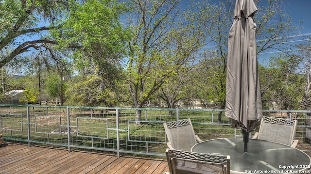 deck featuring outdoor dining space