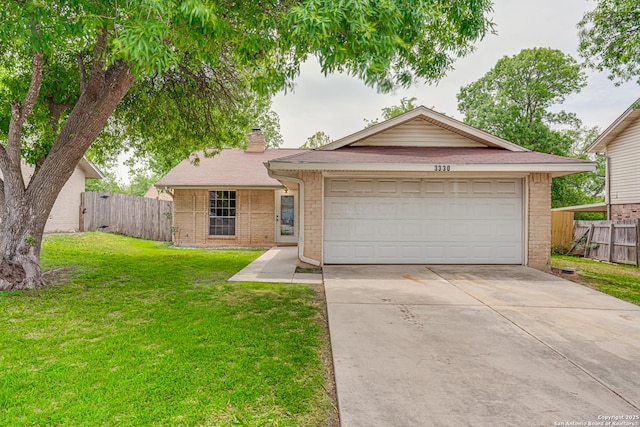 ranch-style house with fence, brick siding, a front yard, and a garage