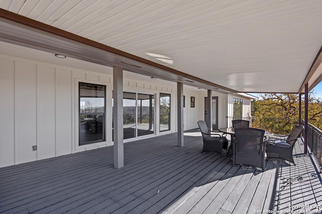 deck featuring outdoor dining space